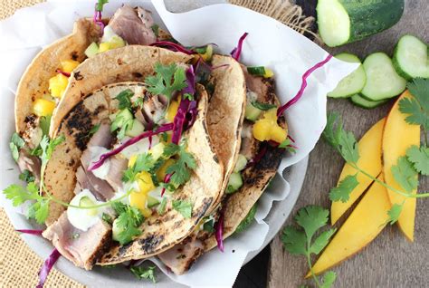 With a mango/cilantro bite, a hint of hot sauce and a halo of sweetness, this spicy dish just begs for seconds. Ahi Tacos w/Cuke-Mango Salsa & Wasabi-Cilantro Sauce ...