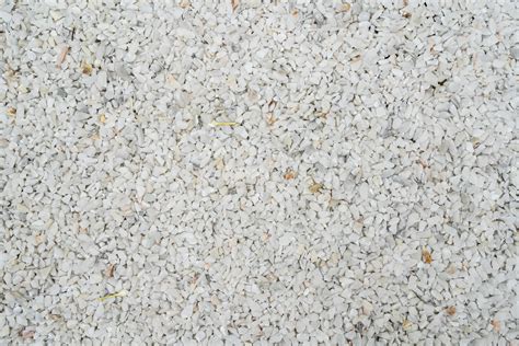 White Pebble Stone Texture On The Ground The Pebbles Closely Stone