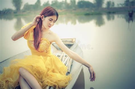 Asia Beautiful Woman In Yellow Dress Sit On Boat Stock Image Image Of