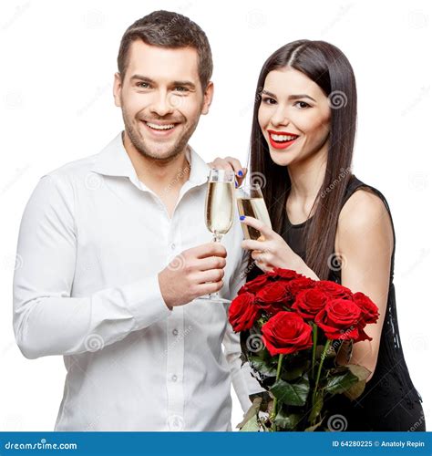 Young Beautiful Couple With Flowers Isolated On White Stock Image