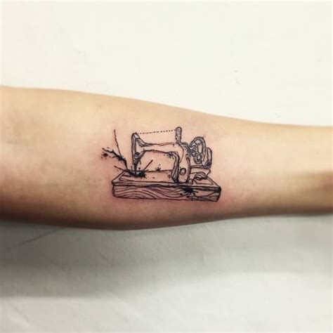 Sewing Machine Tattoo On The Left Inner Forearm