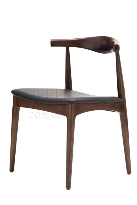 Wegner designed the stackable elbow chair in 1956. Walnut Elbow Chair Replica - Hans Wegner CH20 Elbow Chair ...