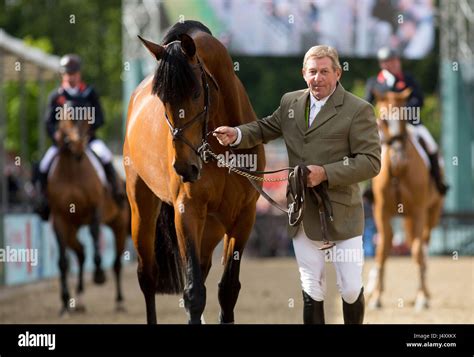 Nick Skelton Walks His Horse Big Star Around The Arena As They Retire