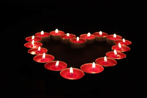 Heart Candles Held In Our Hearts