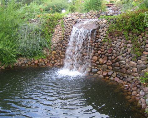 You may also see some with underwater lighting, unique edging details, or even watercourses that add visual interest to the design. Diy Outdoor Pond Waterfall | Pool Design Ideas | Outdoor ...