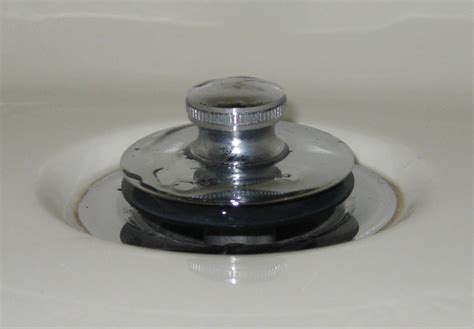 To remove the clog, start by unscrewing the tub drain stopper. How to Fix Problems With Your Bathtub Drain Stopper ...