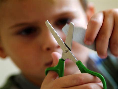 Child Cutting With Scissors Building Blocks Occupational Therapy