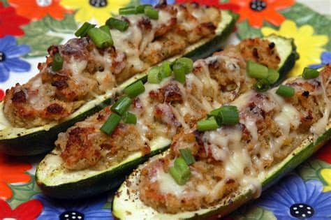 Zucchini boats loaded with lentils and sautéed baby spinach in a lightly spicy tomato sauce and covered with shredded. STUFFED ZUCCHINI BOATS-THE BEST SIDE DISH! - Hugs and ...
