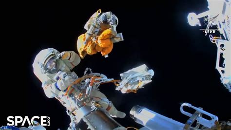 cosmonaut throws away obsolete hardware into space during spacewalk video dailymotion