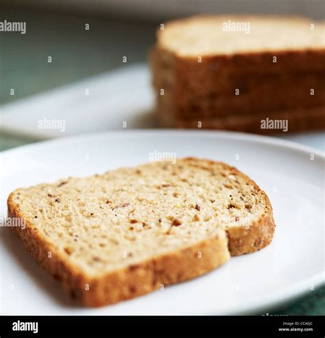 Sliced Brown Bread On Plate Stock Photo Alamy