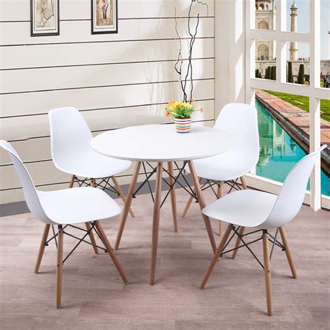 Un beau dessus de table enrobé de bouleau de formica complété avec un ensemble de jambes. 1 Table de Salle à Manger Ronde Blanc + 4 Chaises Blanc ...