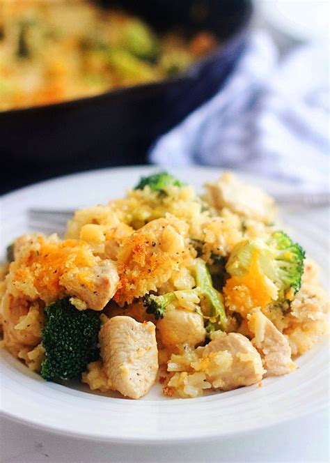 With cold days approaching, this cheesy chicken, broccoli and rice casserole is going to be just the hot and hearty meal you want to come inside to after a long day. Cheesy Chicken Rice and Broccoli Skillet - Life In The Lofthouse