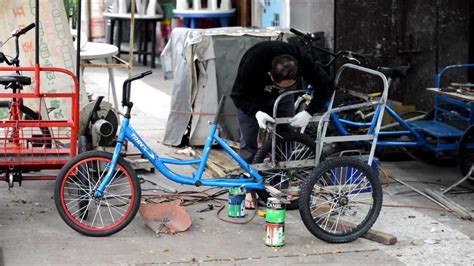 Learning how to ride a bike: Hong Kong. The Rickshaw Maker. Three Seat Bicycle in ...