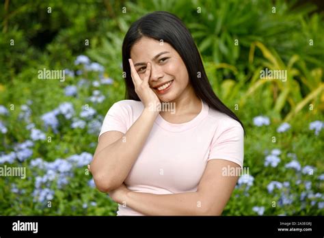 A Shy Youthful Filipina Woman Stock Photo Alamy