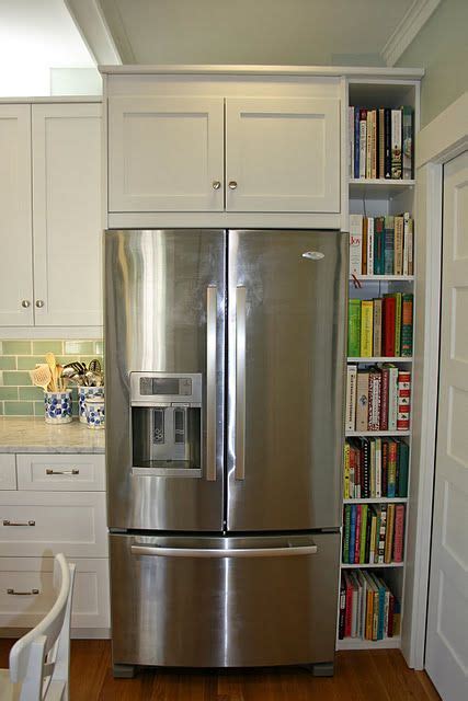 Built in refrigerator beside pantry loaded with pull outs. Cookbook Storage next to fridge. Rockridge Kitchen Tour ...