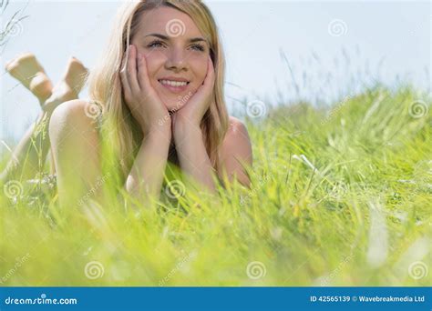Pretty Blonde In Sundress Lying On Grass Smiling Stock Image Image Of Peaceful Style