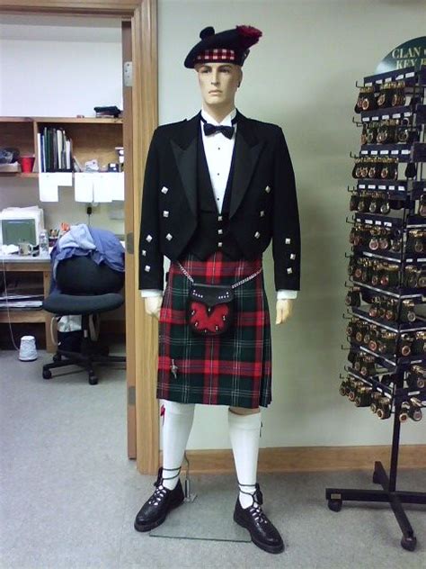 scottish man s kilt with black suit jacket and vest complete with pouch belt and hat black