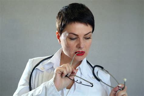 Portrait Of A Beautiful And Female Doctor In A Hospital Stock Image
