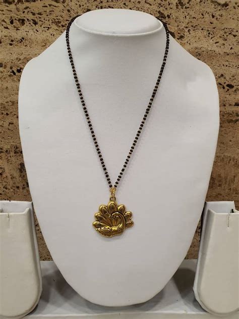 Women Mangalsutra Gold Peacock Pendant Black Beads Single Line Layer