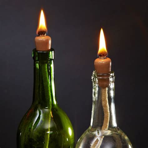 Open a wine bottle with a lighter. Transforming Wine Bottles Into Candles - Candle Inventor