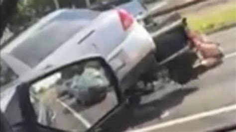 Video Shows Car Run Over Motorcycle In Stunning Road Rage Incident