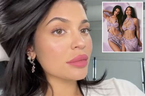 kylie jenner slammed for her fake lips as star shows off large pout while promoting cosmetics