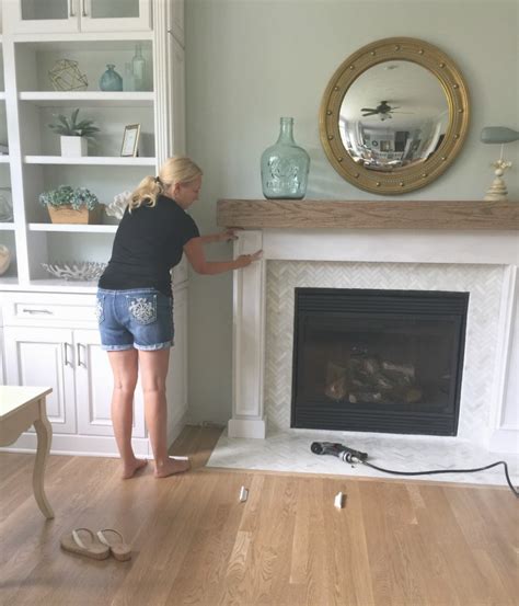 If you're going to have a small plug in heater in the surround, leave it just a few. DIY Wood Beam Mantel