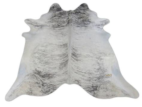 A White And Gray Cowhide Rug On A White Background