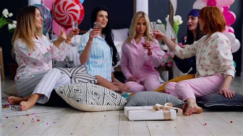 a group of friends enjoying pajama party stock footage sbv 322208278 storyblocks