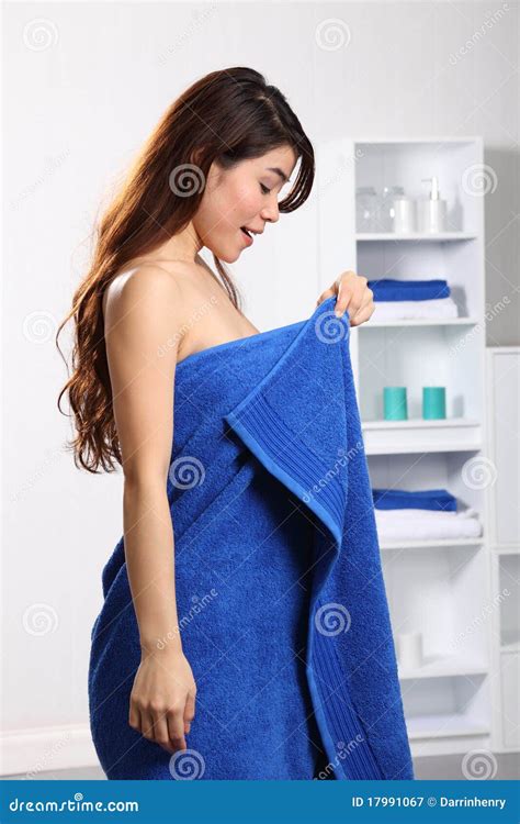 Woman In Bathroom Checking Her Body Under Towel Stock Image Image Of