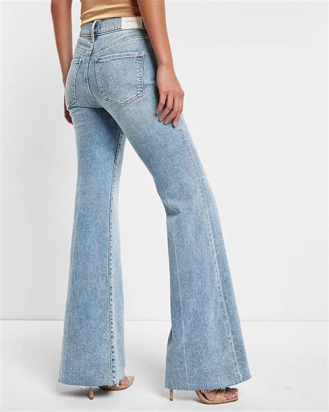 Express Mid Rise Light Wash Raw Hem 70s Flare Jeans In Light Wash