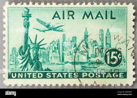 A 1947 15c Us Airmail Postage Stamp Featuring Statue Of Liberty And New