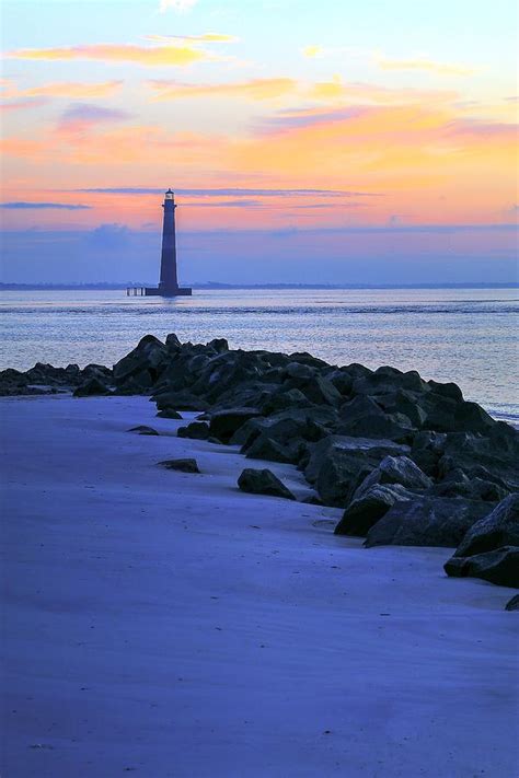 A unique lighthouse the charleston light on sullivan's island has guided mariners into the harbor since 1962. Hazy Sunrise On Morris Island Lighthouse Charleston South ...