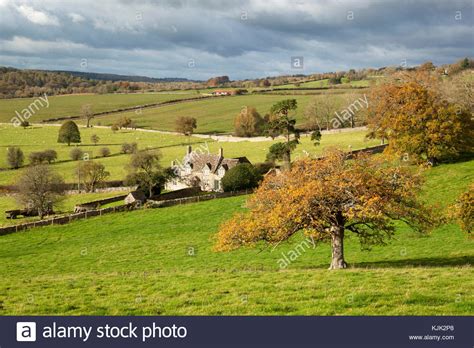 Cotswold Stone Farmhouse Set In Cotswold Landscape In Autumn Stowell