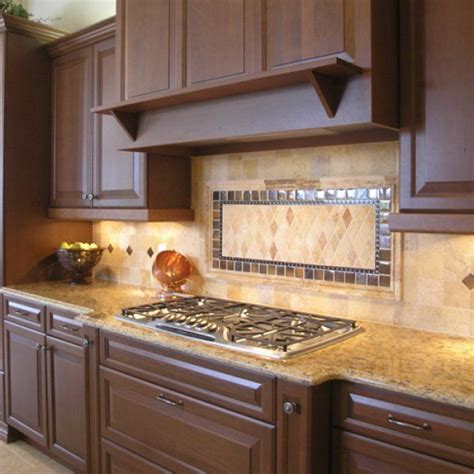 This Backsplash Design Features Several Different Types Of Tiles And