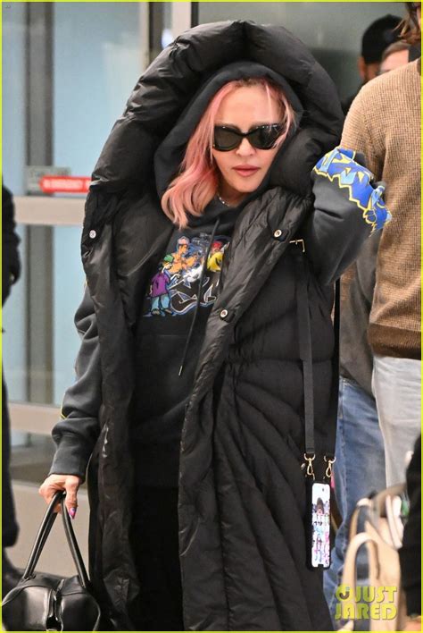 Madonna Shows Off Her Pink Hair While Catching Flight Out Of Nyc Photo