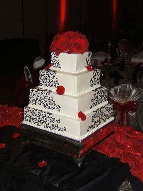 This ombre wedding cake transitions from deep red to a light cream for a festive appeal. Black Scrolls On White Wedding Cake - CakeCentral.com