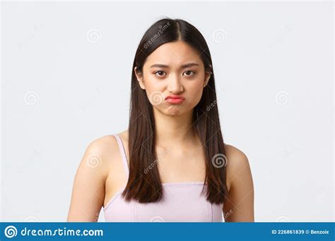 Beauty Fashion And People Emotions Concept Close Up Portrait Of Pouting Upset Cute Asian Girl