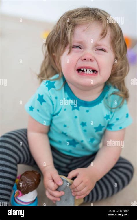 Crying Child On Floor Hi Res Stock Photography And Images Alamy