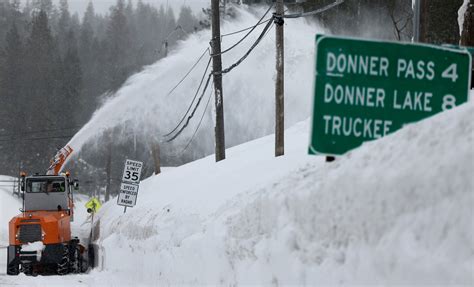 California blizzard leaves residents tunneling out with more snow on