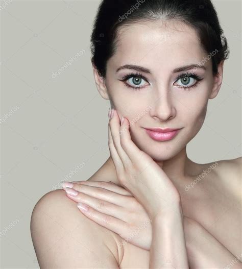 Closeu Portrait Of Beautiful Naked Woman With Hand On Face And Should