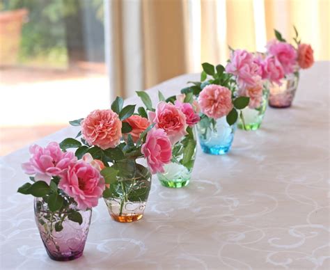 Pink Peonies Pink Roses And Pink Carnations In Clear Glass Vases