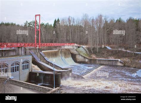 Hydroelectric Power Station Water Level At The Early Winter Green