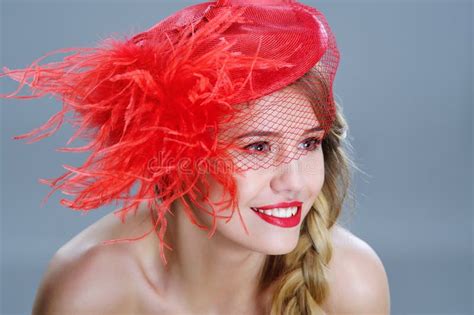 Woman Fashion Portrait In Red Vintage Hat With Feathers Stock Photo