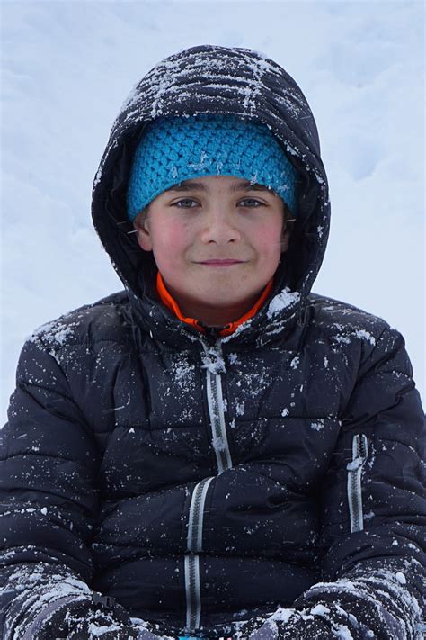 Free Images Snow Cold Winter White Boy Sitting Weather Child