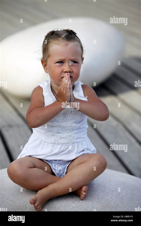 Adorable Little Girl Doing Yoga Stock Photo Alamy
