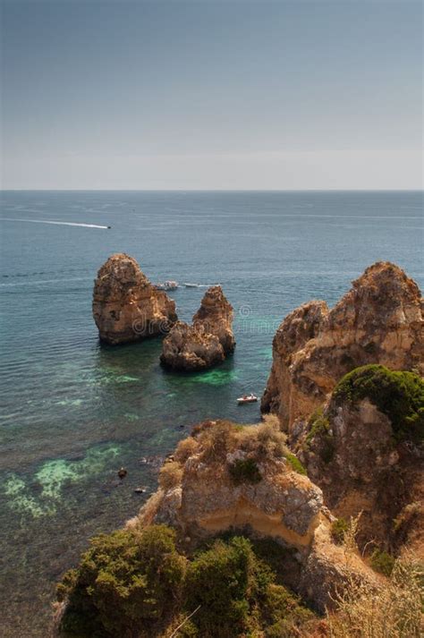 Algarve Coast Portugal Rocks In The Shoreline And Blue Water Stock