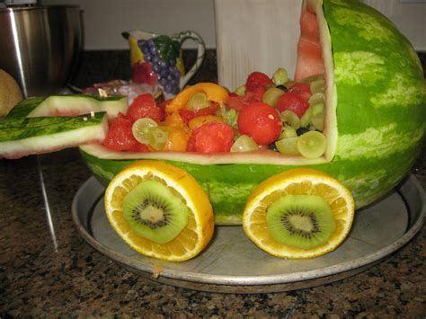 This tasty baby carriage fruit bowl creation makes a stunning centerpiece to a baby shower food table, and offers guests a wide variety of healthy snack options to enjoy while at the shower. Best Ever Recipe Collection: Watermelon Baby Carriage
