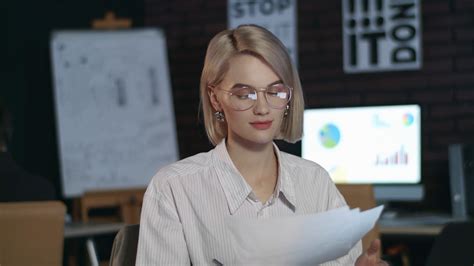 Cheerful Business Woman Working On Laptop In Dark Office