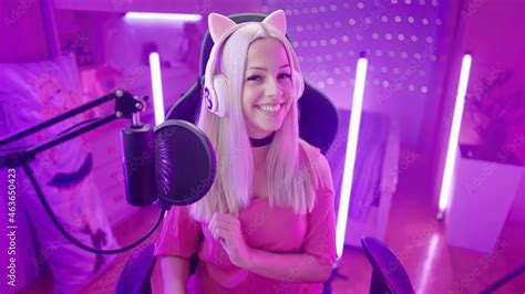 Cute Blonde Gamer Girl Enjoy Streaming And Gaming In Her Pink Bedroom